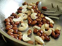 cashews and peanuts sautï¿½ing in ghee