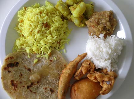 Naivedyam on Vijaya Dasami - Bhakshalu(Poli) with Ghee, Chitrannam, Potato Curry, Tomato Dal, Rice, Bajji with green chilli, potato and onions