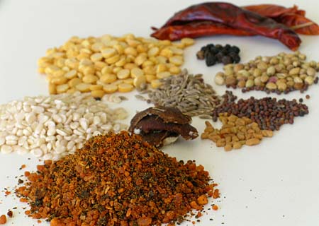 Idli Kaaram - Made of Roased  and Powdered -urad dal, chana dal, Red Chilli, black pepper seeds, cumin, coriander seeds, mustard seeds, fenugreek seeds and tamarind, 